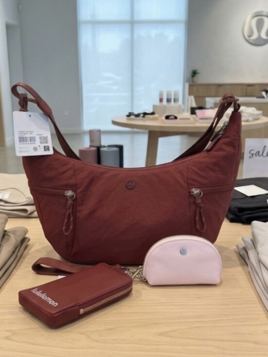 lululemon athletica Handbags - Lululemon Cranberry Charm Slouchy Sling crossbody bag & Wallet Dual Wristlet Set